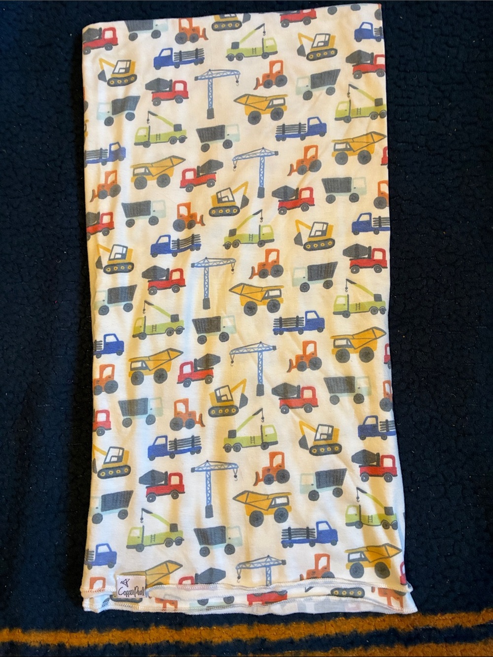 Copper Pearl Baby Blanket - Construction Trucks Print in Blue, Yellow, Orange